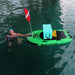 Squatch and Siren Sea Sleigher moray green most convenient and best inflatable dive raft on the water with a cooler and adult on the side.