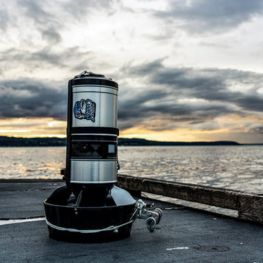 Dive Xtras CudaX TECH Underwater Scooter SILVER color on a pier.